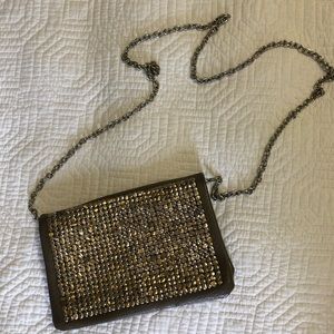 Studded cross body bag